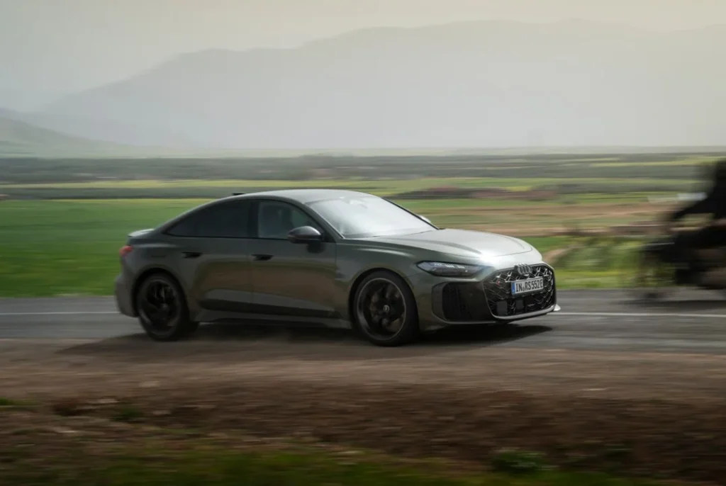 The 630hp Audi RS5 uses a 2.9-litre twin-turbo V6 and electrified dynamic torque vectoring to conquer the mountain roads of Morocco with devastating speed.