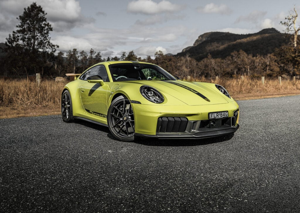 Our Porsche 911 Carrera 4 GTS T-Hybrid review finds hybrid assistance adds response and pace without losing the 911’s everyday appeal.