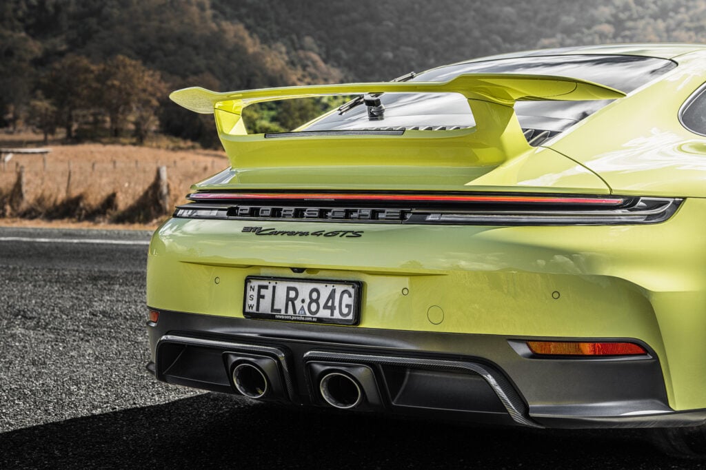 Our Porsche 911 Carrera 4 GTS T-Hybrid review finds hybrid assistance adds response and pace without losing the 911’s everyday appeal.